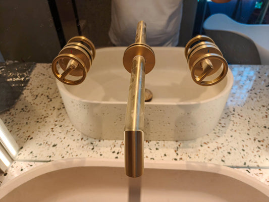 Rivius Giltwirl – Brushed Gold Wall-Mount Faucet With Twin Circular Handles